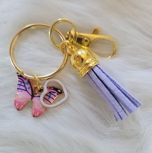 Butterfly 🦋 keychain with heart charm and tassle